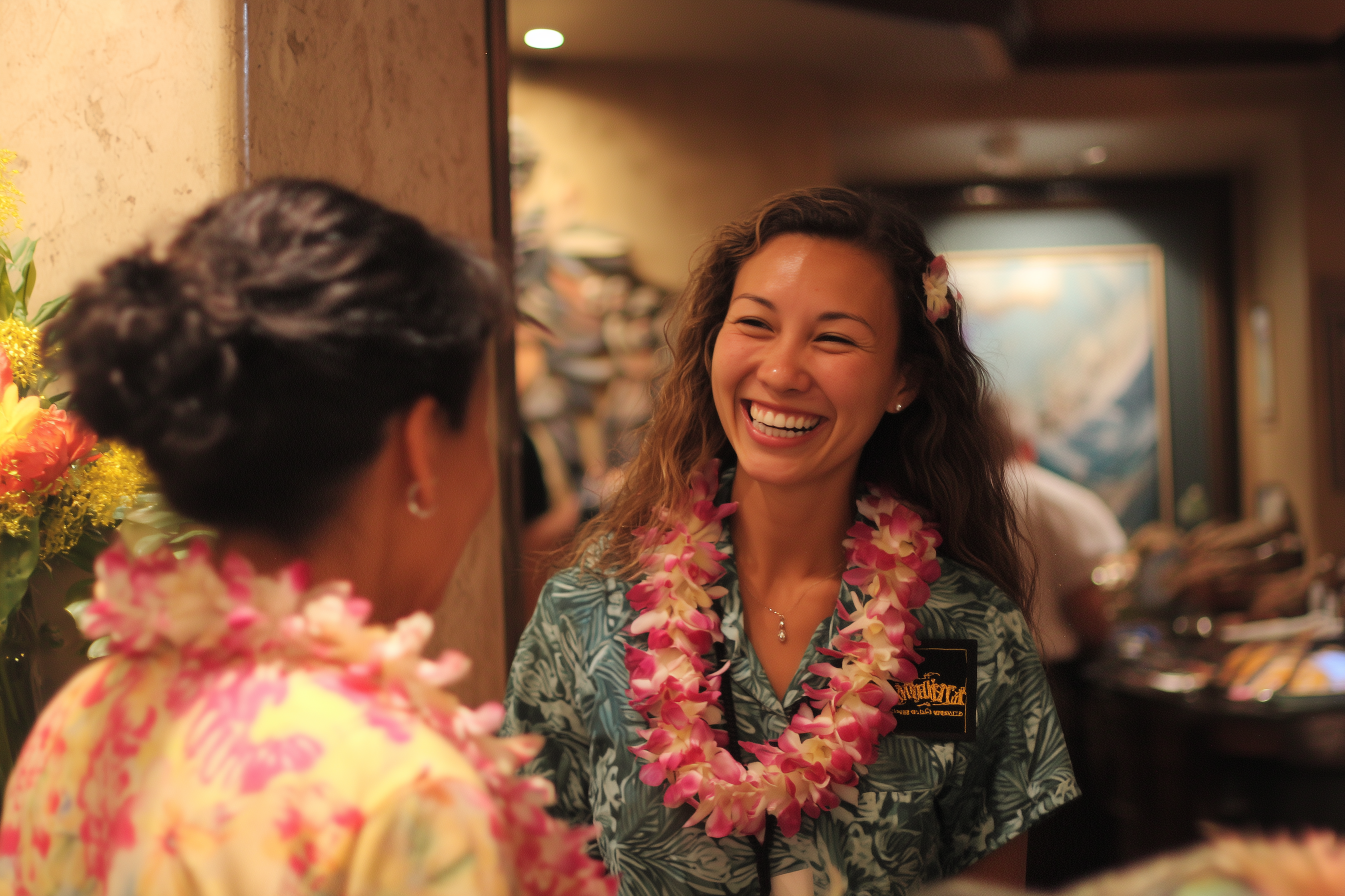 Smiling Hawaiian woman greeting a guest at the door