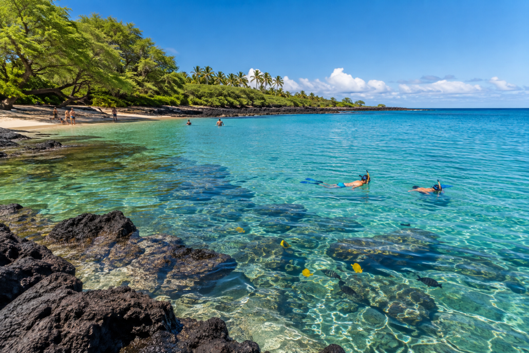 Two people snorkeling in Hawaii